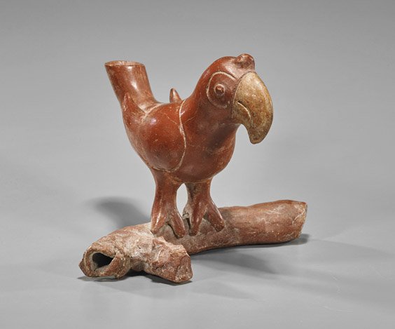 Pre-Columbian Redware Pottery Parrot: Pre-Columbian Redware Pottery ParrotPre-Columbian, possibly Colima, redware pottery parrot; the bird perched on a branch, leaning slightly forward with tail raised (considerable wear and cracks, some