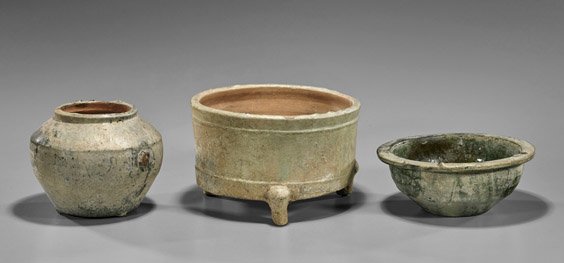 Three Han Dynasty Green Glazed Vessels: Three Han Dynasty Green Glazed Vessels Group of three Chinese Han Dynasty green glazed pottery vessels: deep bowl with flat rim and slight iridescence; tripod censer; together with short rim baluster 