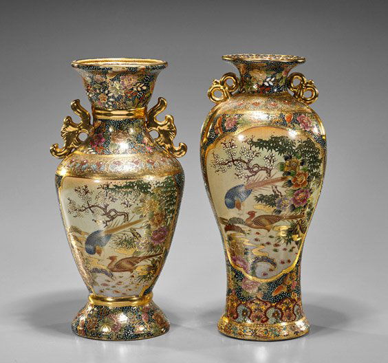 Two Old Japanese Satsuma Vases: Two Old Japanese Satsuma VasesTwo old Japanese Satsuma vases: each with birds amid blossoming flowers in reserves on scrolling floral black ground and moulded handles: high shoulder and baluster form