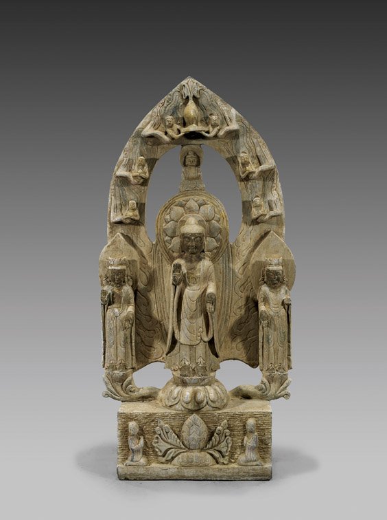 Large Chinese Carved Stone Stele: Large Chinese Carved Stone Stele Large Chinese carved stone Buddhist stele; with deity at center, flanked by an attendant to either side, with flying apsaras and a flowering vase above to the mandorla