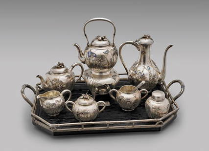 ANTIQUE SAMURAI SHOKAI SILVER TEA SET: ANTIQUE SAMURAI SHOKAI SILVER TEA SETAntique, eleven-piece set Japanese sterling silver and enamel tea service by Samurai Shokai Yokohama, of beautifully repoussé and enameled iris design, the domed