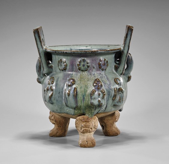 Yuan-Style Moulded Jun Glazed Censer: Yuan-Style Moulded Jun Glazed Censer Chinese Yuan-style jun-type glazed censer; resting upon three claw feet, moulded Buddhist figures to body, large double handles to neck (some wear and firing flaws