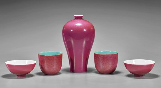 Five Chinese Pink Monochrome Porcelains: Five Chinese Pink Monochrome PorcelainsGroup of five Chinese pink monochrome glazed porcelains, including: small meiping vase; pair of shallow circular bowls; together with pair of wine cups with inci