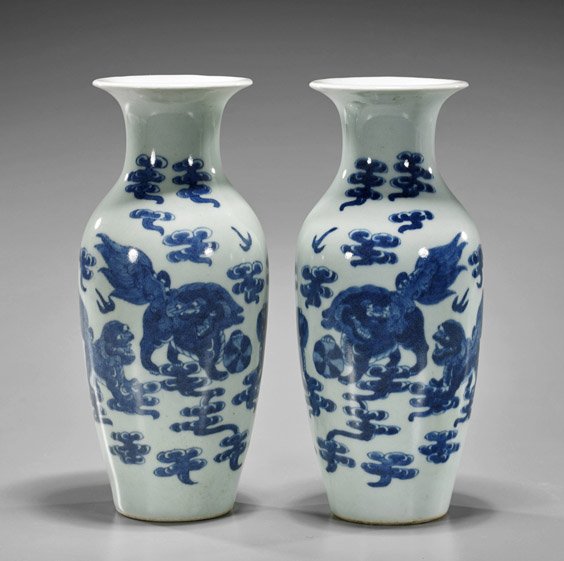 Pair Antique Chinese Porcelain Vases: Pair Antique Chinese Porcelain Vases Pair of antique Chinese blue and white porcelain vases; each lantern form with flared rim, depicting Fo Lions amid celestial field (minor wear); H: 9" (each)