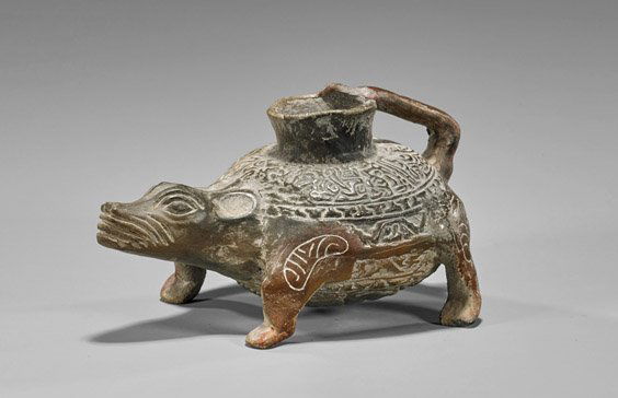 Pre-Columbian Colima Zoomorphic Vessel: Pre-Columbian Colima Zoomorphic VesselSmall West Mexican Pre-Columbian (Colima) zoomorphic redware pottery vessel; of deer-like head with circular body resting on four paws, the body with various desi