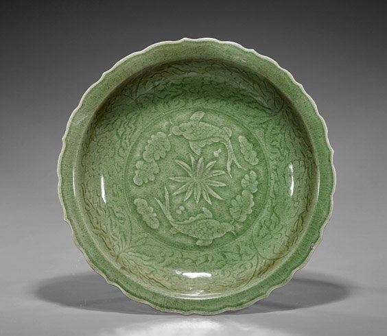 Yuan-Style Celadon Double Fish Charger: Yuan-Style Celadon Double Fish ChargerChinese Yuan-style celadon glazed porcelain charger; of foliate rim with moulded double fish design to center with incised floral designs along the sides (slight