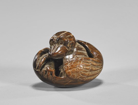 Carved Wood Netsuke: Karasu-Tengu: Carved Wood Netsuke: Karasu-Tengu Carved wood netsuke; of Karasu-Tengu emerging from egg, signed; Provenance: by repute ex-Clark Collection, Honolulu