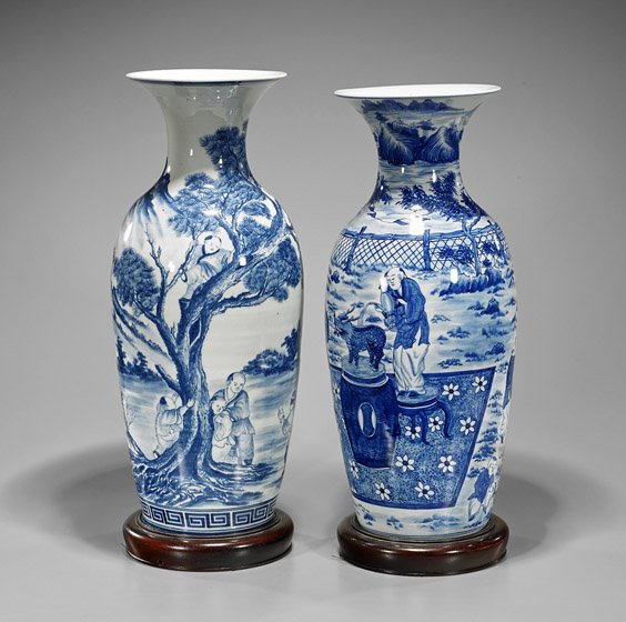 Two Tall Chinese Blue & White Vases: Two Tall Chinese Blue & White Vases Two tall Chinese blue and white porcelain vases; each of ovoid form with tall flaring neck, depicting figures in a landscape (usual minor wear); H: 20" (slightly ta