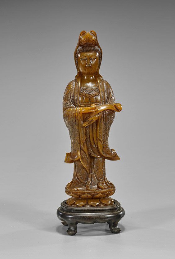Chinese Carved Soapstone Guanyin: Chinese Carved Soapstone Guanyin Chinese carved soapstone Guanyin; standing atop a double lotus base wearing elaborate robes and adorned with jewelry, holding a scepter in her left arm and a pearl in 