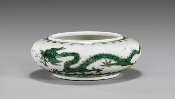 Green Dragon Porcelain Brushwasher: Green Dragon Porcelain Brushwasher Old Chinese green enameled porcelain brushwasher; of flattened disc-form; the exterior with design of writhing dragons amid clouds; Daoguang Mark and probably of the