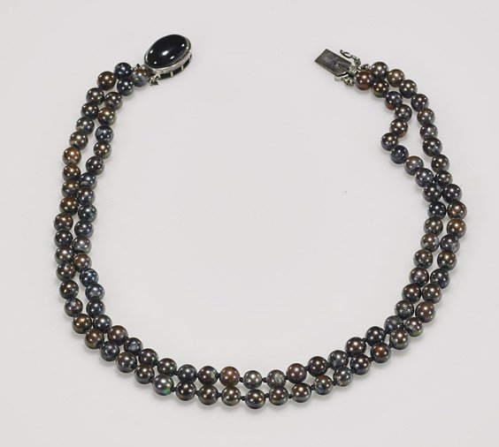 Ladies' Double Strand Tahitian Pearl Choker: Ladies' Double Strand Tahitian Pearl Choker Ladies' double strand Tahitian pearl choker necklace; comprised of nearly uniform 6mm pearls with hints of greens and reds; a large black cabochon clasp; L: