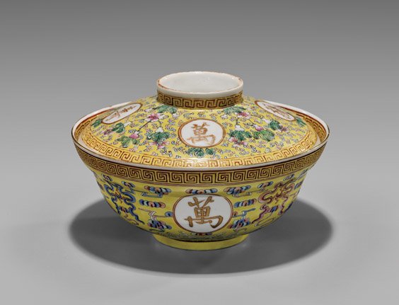 LARGE ANTIQUE PORCELAIN COVERED BOWL: LARGE ANTIQUE PORCELAIN COVERED BOWLLarge and antique, Chinese enameled porcelain covered bowl; the wide footed form with design of yellow ground "birthday pattern" of ribboned festoons above lishui b