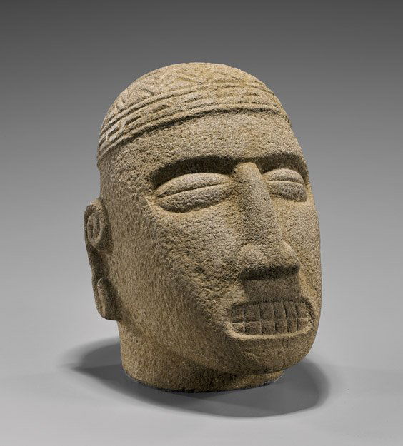 LARGE CARVED STONE HEAD (1 of 3)