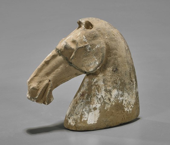 Han Dynasty Unglazed Pottery Horse's Head: Han Dynasty Unglazed Pottery Horse's Head Chinese Han Dynasty unglazed pottery horse's head; with lips pulled back, showing teeth (repaired snout); H: 6"