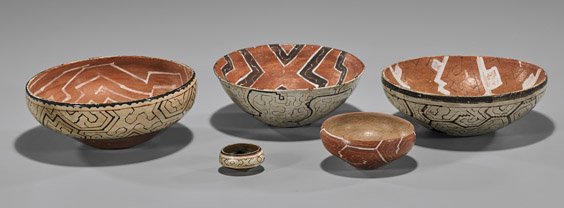 FIVE PRE-COLUMBIAN SHIPIBO PAINTED BOWLS: FIVE PRE-COLUMBIAN SHIPIBO PAINTED BOWLS Group of five Pre-Columbian, Peruvian (Shipibo), painted pottery bowls; of graduated sizes with various geometrical designs in red, white and brown slip; D: 9 