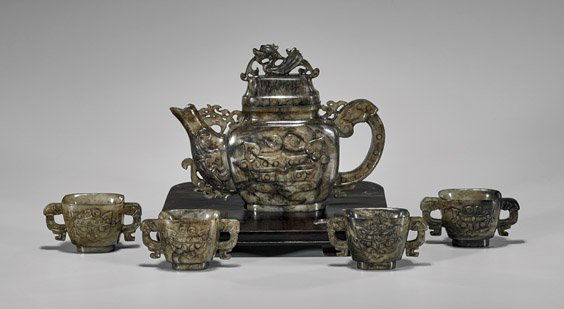 FIVE-PIECE CARVED MOTTLED JADE TEA SET (1 of 2)