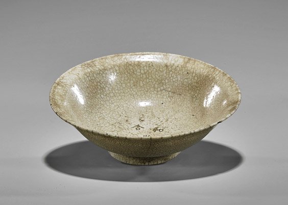 Ming Dynasty Crackle Glazed Bowl: Ming Dynasty Crackle Glazed Bowl Chinese Ming Dynasty crackle glazed bowl; of semi-conical form on short raised base; inscription to interior; D: 8 1/2"; Provenance: purchased from I.M. Chait in April