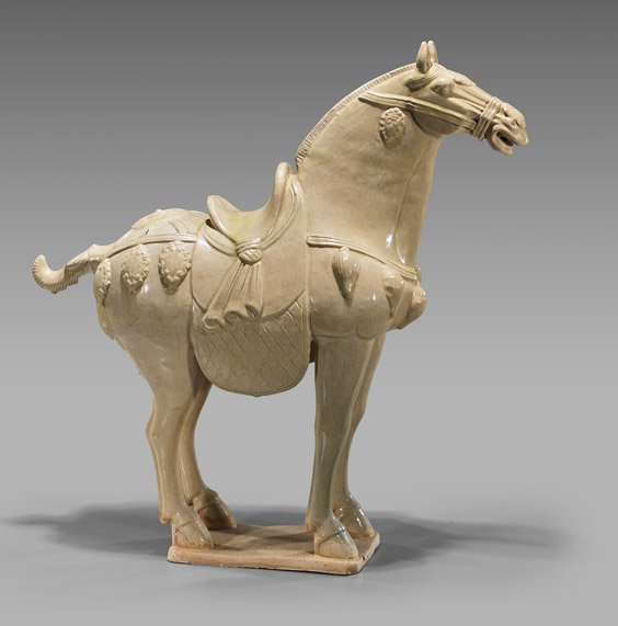 Tall Tang-Style Straw Glazed Pottery Horse: Tall Tang-Style Straw Glazed Pottery HorseTall Chinese Tang-style straw-glazed pottery horse; standing four-square atop a plinth; H: 27 1/2"