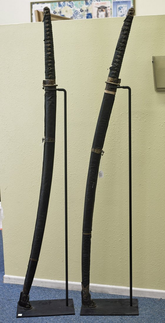 Pair of Old Japanese-Style Great Swords: Pair of Old Japanese-Style Great SwordsPair of old and large Japanese-style great swords; the blades measuring 39 1/2" approx. with gilt collar (habaki), gilt bronze guard tsuba; the handle with wrapp