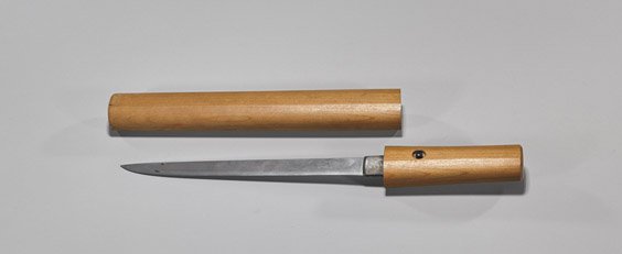 Old Shinto Tanto Sword: Old Shinto Tanto Sword Old Japanese late Shinto period tanto sword; the blade measuring 7" approx., of typical hiro shape; signed Tsuguhide; in simple wood storage scabbard (shirasaya); approx. 1750; 