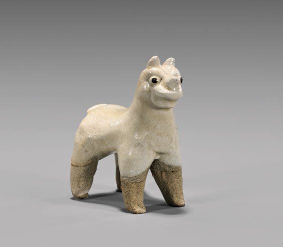 MING DYNASTY MINIATURE CIZHOU DOG: MING DYNASTY MINIATURE CIZHOU DOG Finely modeled, Chinese Ming Dynasty, miniature Cizhou pottery model of a dog, standing tall and at alert; H: 2 5/8"