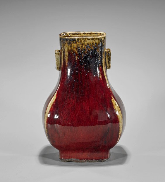 Guangxu-Style Ox Blood Glazed Hu Vase: Guangxu-Style Ox Blood Glazed Hu Vase Chinese Guangxu-style ox blood glazed porcelain vase; of hu form on a square base and barrel handles, 6-character mark; H: 11 1/4"