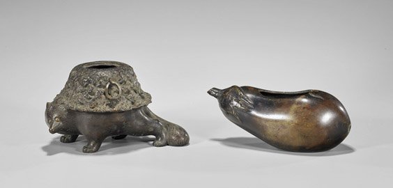 Two Antique Japanese Bronzes: Washer & Censer: Two Antique Japanese Bronzes: Washer & Censer Two antique Japanese bronzes: eggplant-form brushwasher; together with Tanuki as a tea kettle censer, signed; L: 6 1/2" (larger); Provenance: From the Has
