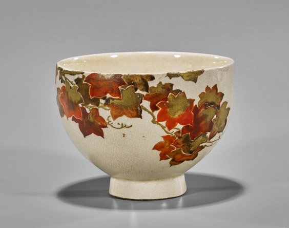 Antique Japanese Maple Leaves Teabowl: Antique Japanese Maple Leaves TeabowlAntique Japanese teabowl; the well potted bulbous "wooden bowl" form set on a tall foot, with design of maple leaves in tones of red and gilt; illegible mark, prob