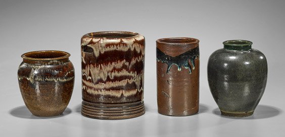 Four Old & Antique Japanese Vessels: Four Old & Antique Japanese Vessels Group of four old and antique Japanese vessels: cylindrical hibachi with two handle openings; cylindrical with drip glazing on a brown ground; ovoid vase with oil-s