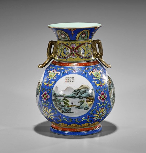 Qianlong-Style Sectional Porcelain Vase: Chinese Qianlong-style sectional porcelain vase with movable handles; of hu form with four Famille Rose enameled roundels, scrolling archaistic flowers on blue ground; seal mark;; H: 10 3/8"