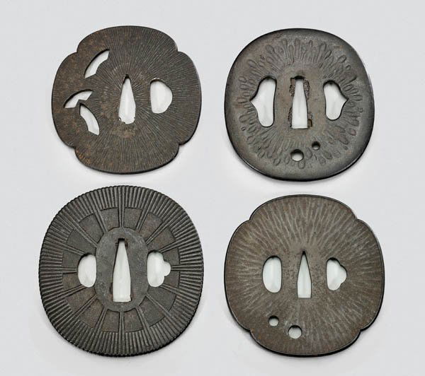 FOUR ANTIQUE JAPANESE IRON TSUBA (1 of 2)