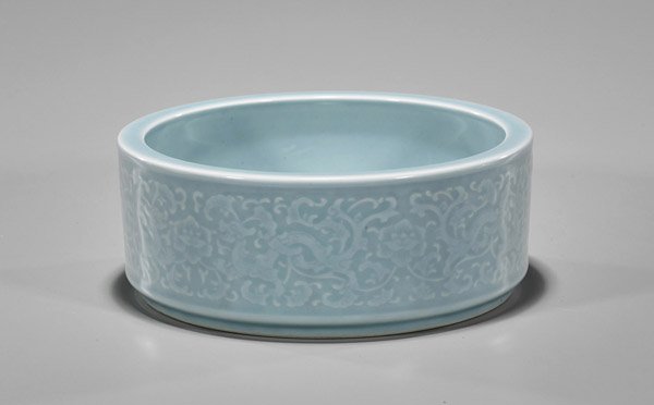 Qianglong-Style Clair de Lune Moulded Basin: Chinese Qianlong-style clare de lune glazed moulded porcelain basin; of rounded form with archaistic dragons amid scrolling vines; seal mark; D: 8 1/4"