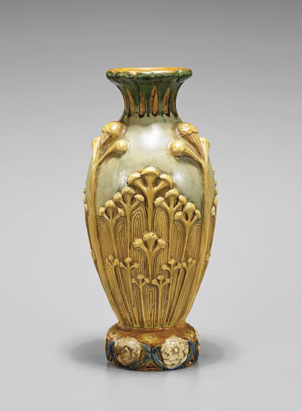 ART NOUVEAU MOULDED POTTERY VASE: Art Nouveau pottery vase; the ovoid form modeled with ribs of stylized flower buds with waisted neck, and a bulbous base modeled with blossoms; glazed in a natural palette of tan, green, and cream wit