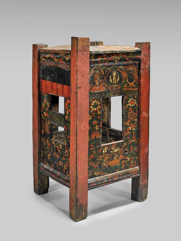 ANTIQUE MONGOLIAN BUDDHIST SHRINE: Antique Mongolian Buddhist painted wood shrine; the rectangular open form with painted panels of deities amid floral grounds in vibrant colors; with a red squared column at each corner; Provenance: Es