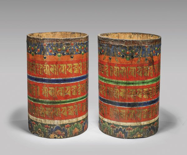 PAIR OF TIBETAN OR MONGOLIAN PRAYER WHEELS: Pair of elaborately painted and of large temple size, Tibetan or Mongolian wood prayer wheels; the cylindrical barrel forms each with three rows of mantras between decorative borders above and below; 