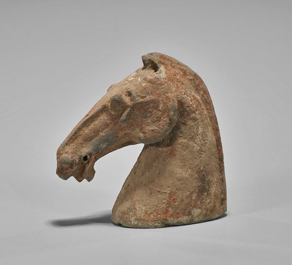 Han Dynasty Painted Pottery Horse's Head: Chinese Han Dynasty painted pottery horse's head; with the mouth slightly open, some pigment remains; H: 6 1/8"