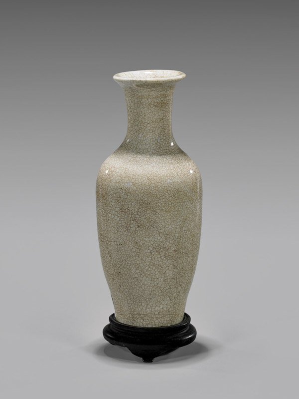 Antique Chinese Anhua & Crackle-Glazed Vase: Antique Chinese, finely cream crackle-glazed porcelain vase; of ovoid form with waisted neck and flared rim; with unusual anhua design of lily plants to the front; Provenance: From the Hashimoto Estat