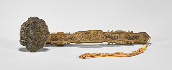 Chinese Carved Wood Ruyi Scepter: Chinese carved wood ruyi scepter; the shaft with well-detailed dragons contesting the flaming pearl, the lingzhi form head with a sinuous dragon, rust-orange tassel; L: 12"