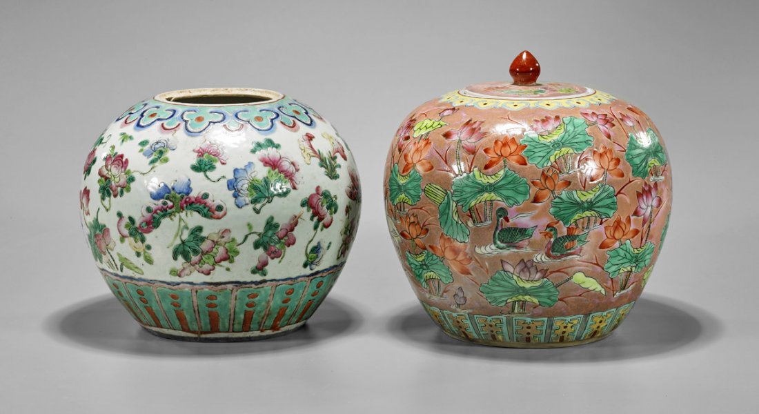 Two Old Chinese Famille Rose Ginger Jars: Two old Chinese Famille Rose enameled porcelain ginger jars; one with design of birds amid pond flora on a peach-pink ground, matching cover; the other with birds, flowers and fruit on a white ground;