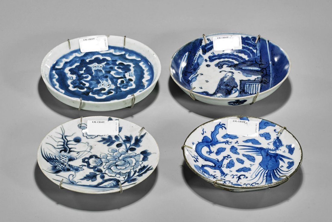Four Antique Chinese & Vietnamese Porcelain Dishes: Group of four antique Chinese and Vietnamese blue and white porcelain plates; one with figural design, the others with dragon and phoenix motifs; each with mark to base; D: 6 1/8" (largest)
