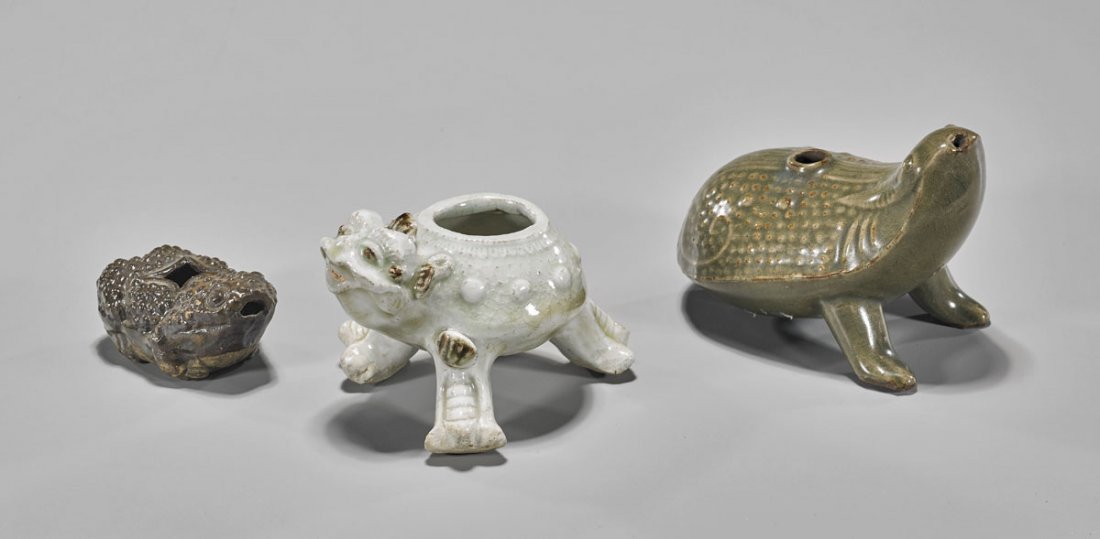 Three Old Chinese Glazed Waterdroppers: Toads & Turtle: Three old Chinese glazed waterdroppers: celadon turtle with head raised; small brown textured toad; together with yingqing -type Chan Chu; L: 5" (longest)