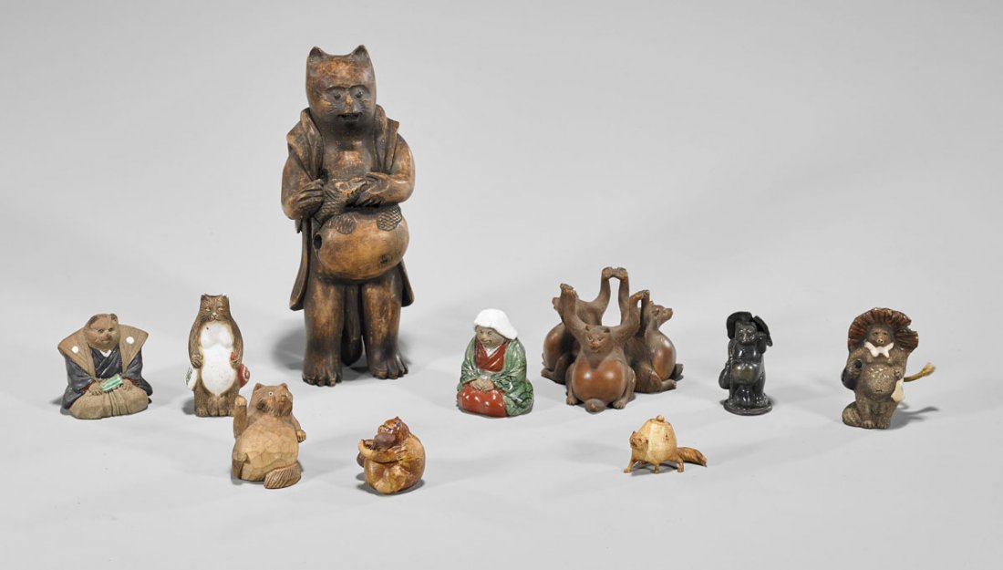 Collection of Japanese Tanuki Figurines (1 of 1)