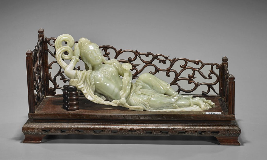 Large Old Chinese Carved Bowenite Reclining Guanyin: Large and old, Chinese carved bowenite figure; of Guanyin in reclined position, adorned in beaded garlands, and holding a large ruyi scepter; Provenance: From the Collection of Eugene Iglesias; L: 16&