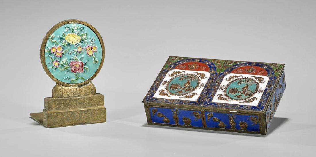 Old Chinese Card Box & Mounted Plaque: Two old Chinese items: circular porcelain plaque with moulded and enameled flowers in relief, mounted in an ornately engraved brass stand; together with enameled metal playing card box, with repouss&e