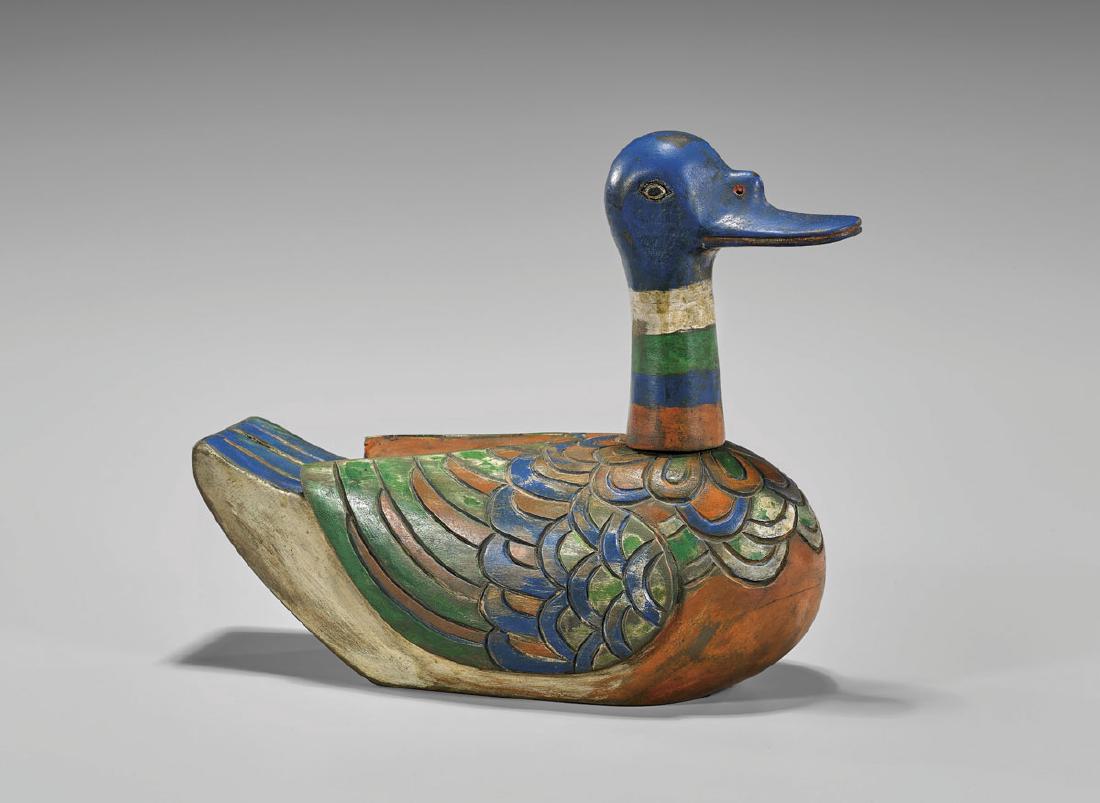Antique Korean Painted Wood Duck: Antique Korean carved and painted stylized wood duck; the body with well-detailed plumage, the head carved separately; 19th Century; L: 10 1/2"