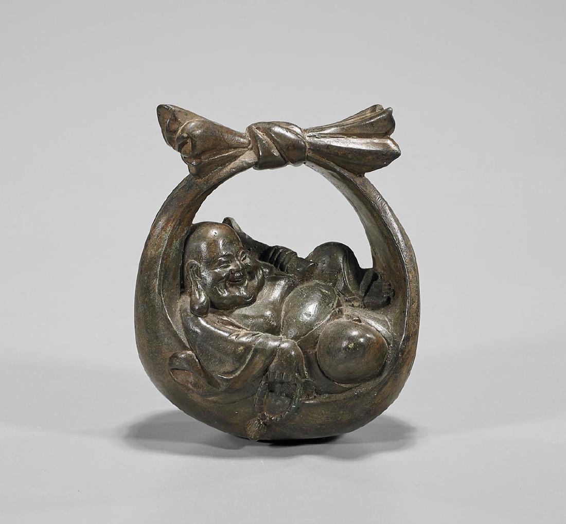Antique Japanese Bronze Hotei: Antique Japanese bronze figure of Hotei; reclining with prayer beads in hand; H: 5" (approx.)