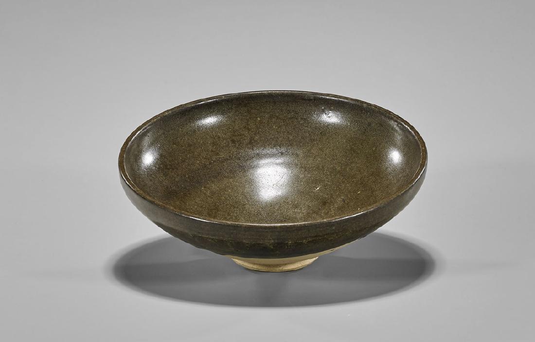 Chinese Parcel Glazed Pottery Bowl: Chinese pottery bowl; with smooth, rich brown glaze to interior and upper half of exterior; possibly Jin Dynasty; D: 7 3/4"