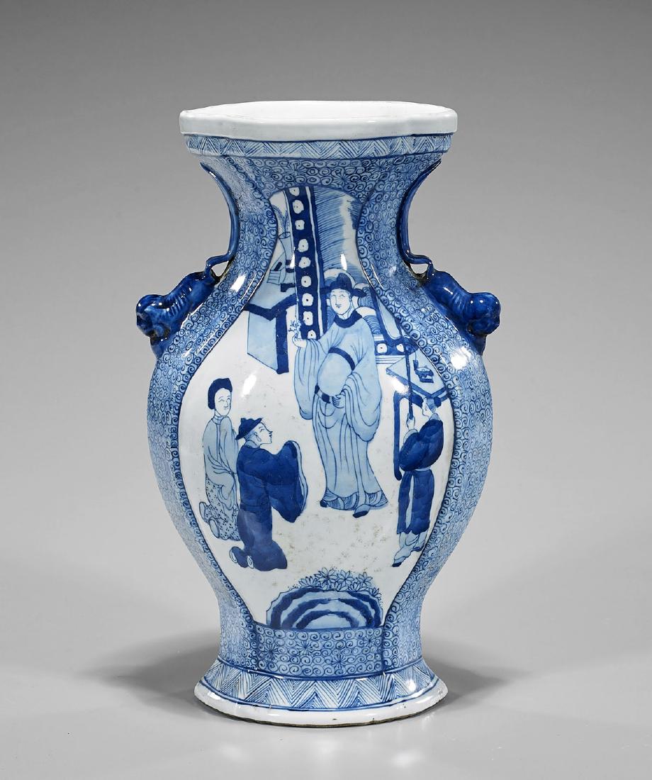Kangxi-Style Blue & White Porcelain Vase: Chinese Kangxi-style blue and white porcelain vase; of somewhat lobed form, with figural panels set on a densely patterned ground; moulded animal handles to neck and leaf mark to base; H: 13 1/4" 