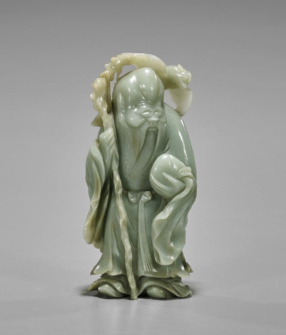 Carved Celadon Jade Figure of Shoulao (1 of 2)