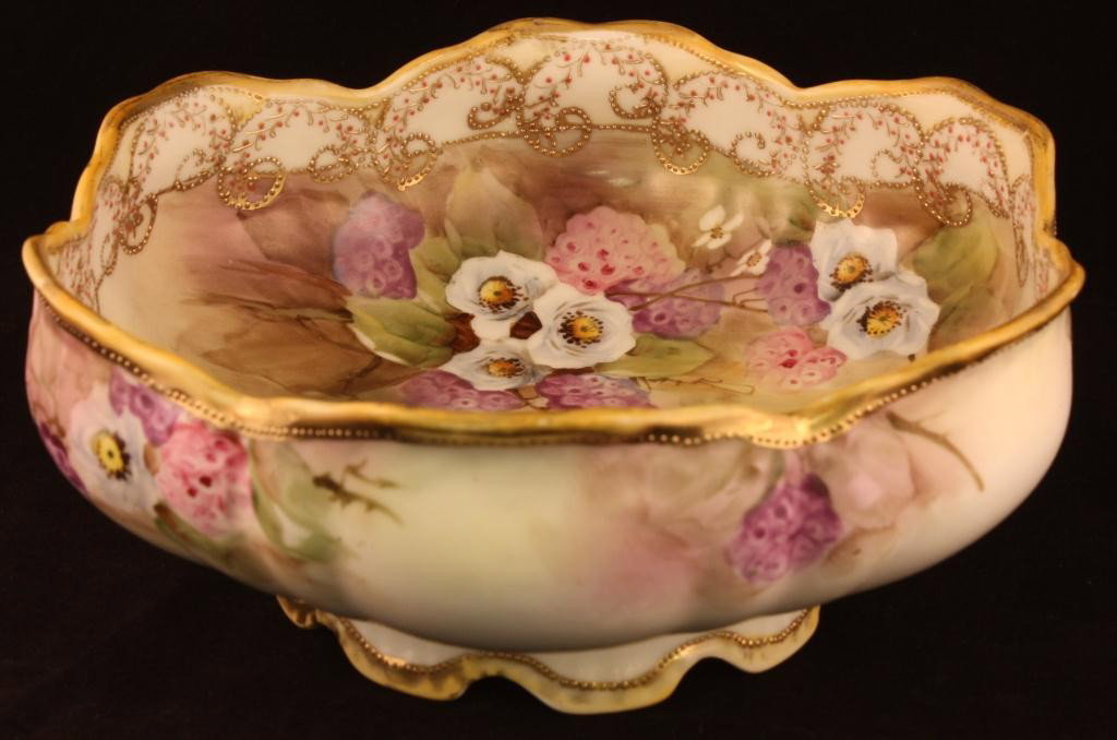 NIPPON Footed Bowl with Raised Gold Beading: 8 1/2 x 31/2" tall with floral scene on bottom. Delicate floral scene around outside of bowl. Excellent condition with minimal gold lost to top rim and foot. Mark #52.